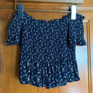 Navy blue crop top with flower pattern